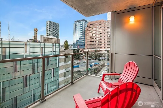 a view of a balcony with chair