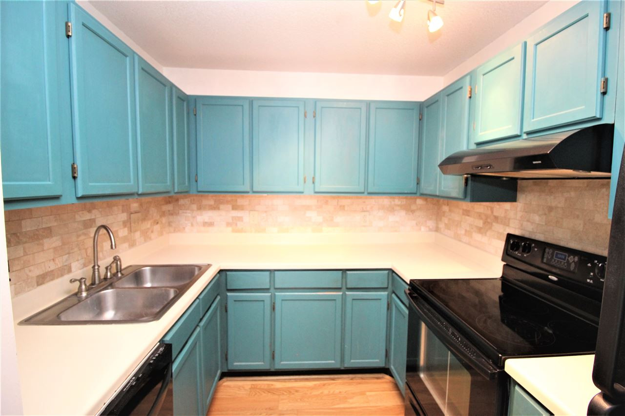 4621 Timbermill Court, Unit 301 Raleigh, NC 27612 - Photo 6 of 24 The Kitchen is the perfect size and layout and perfect for entertaining! Plenty of cabinet and counter space, open to the living room! Kitchen