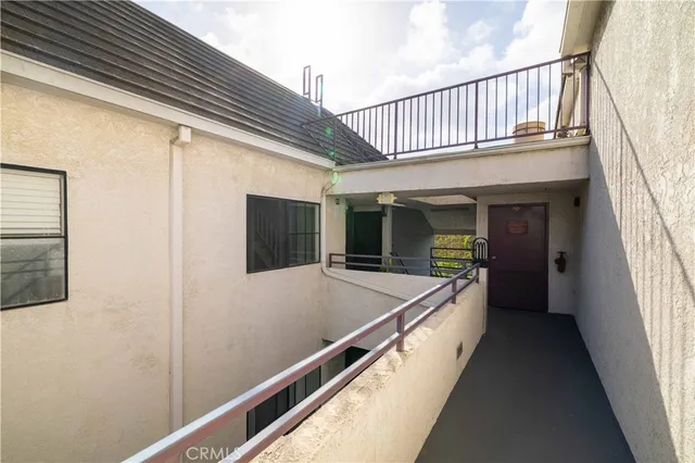 a view of balcony with furniture