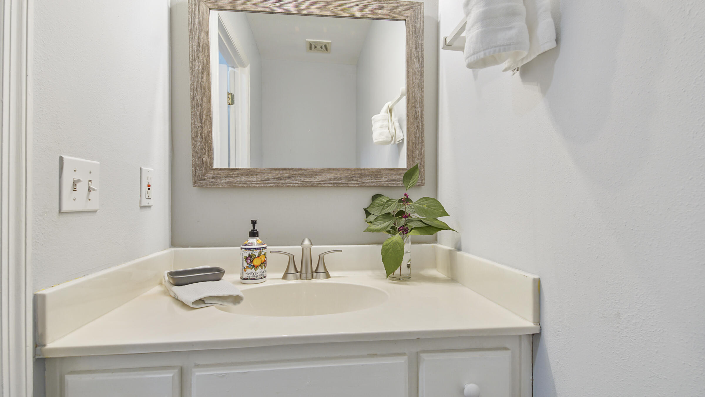 51 Cypress Street, Unit 275 Santa Rosa Beach, FL 32459 - Photo 12 of 37 a bathroom with a sink and a mirror
