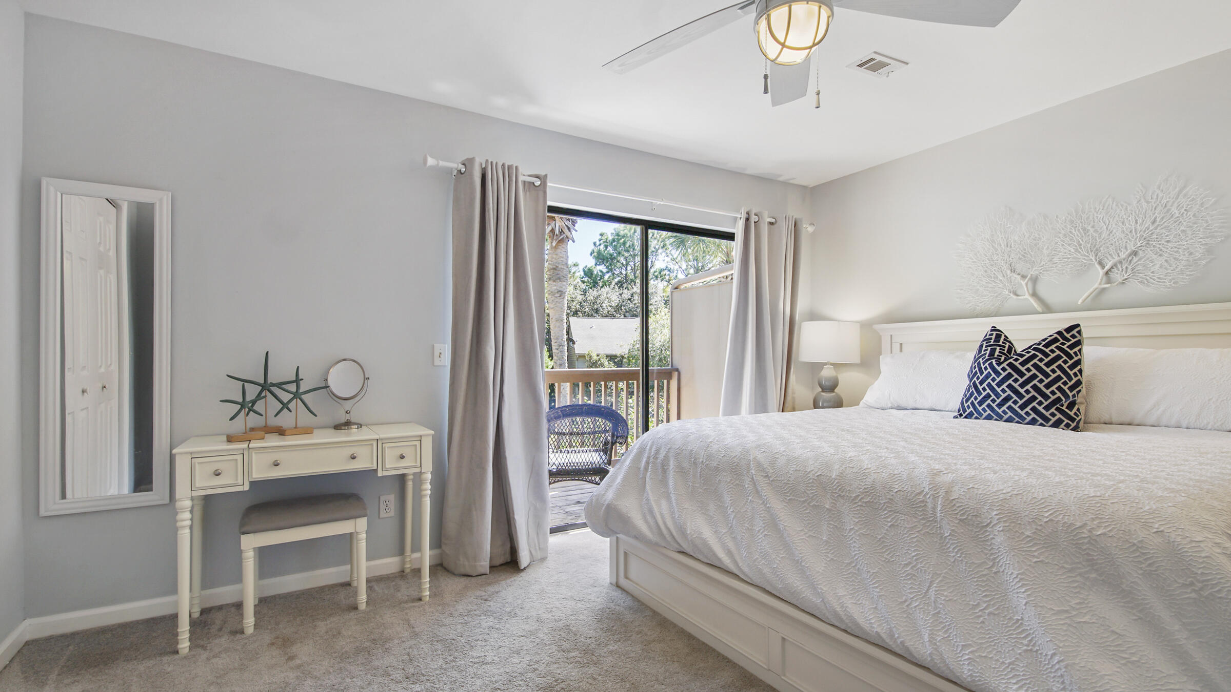 51 Cypress Street, Unit 275 Santa Rosa Beach, FL 32459 - Photo 15 of 37 a bedroom with a bed and a table chair