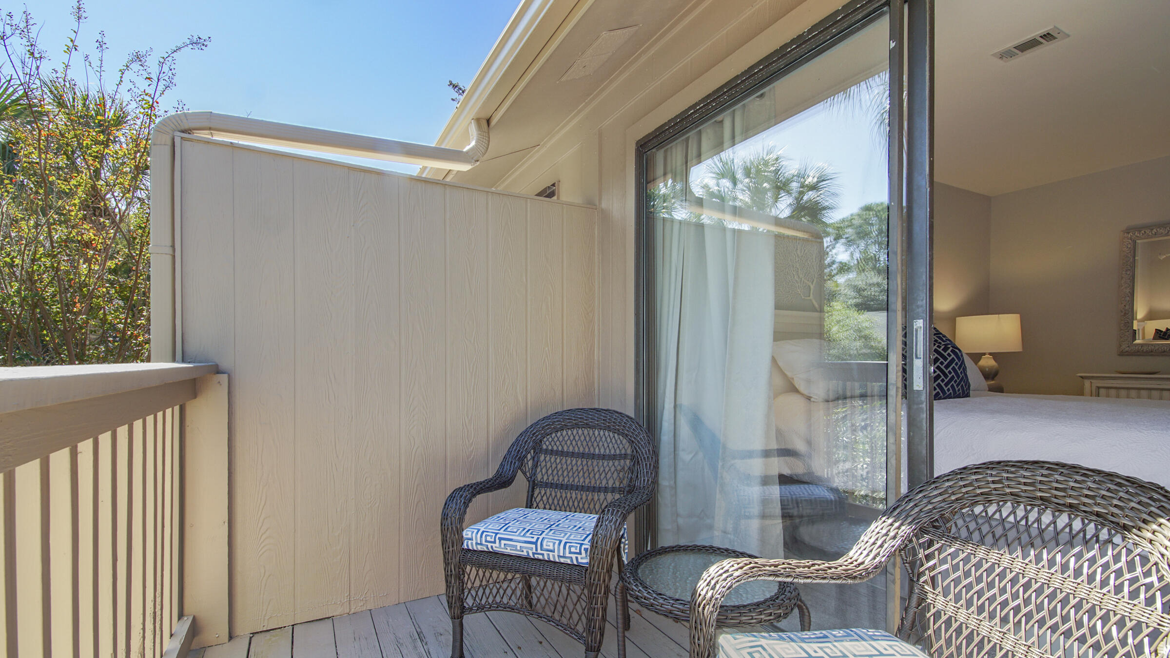 51 Cypress Street, Unit 275 Santa Rosa Beach, FL 32459 - Photo 17 of 37 a bedroom with a bed and wooden floor