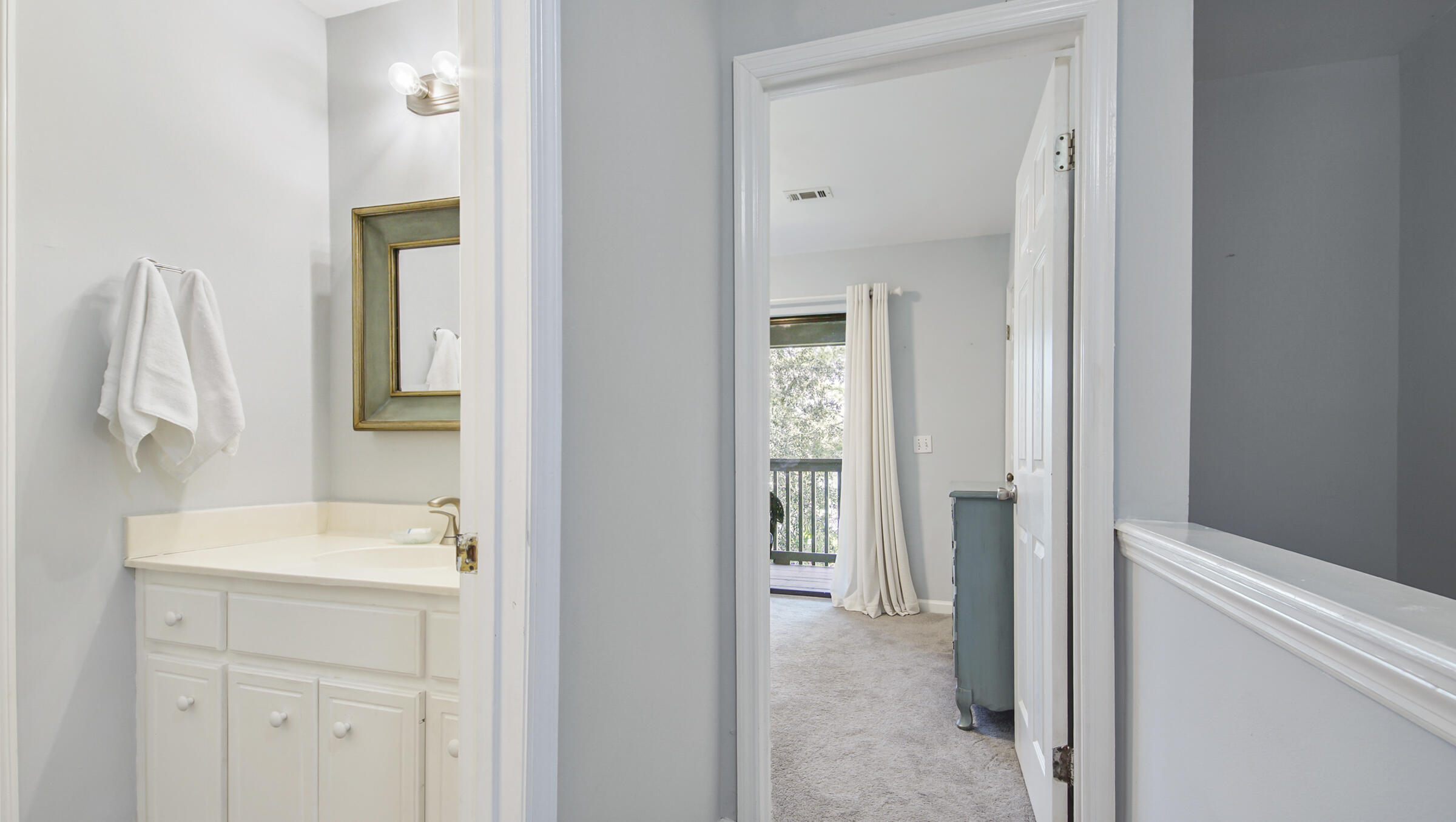 51 Cypress Street, Unit 275 Santa Rosa Beach, FL 32459 - Photo 19 of 37 a en suite bathroom with a sink and mirror