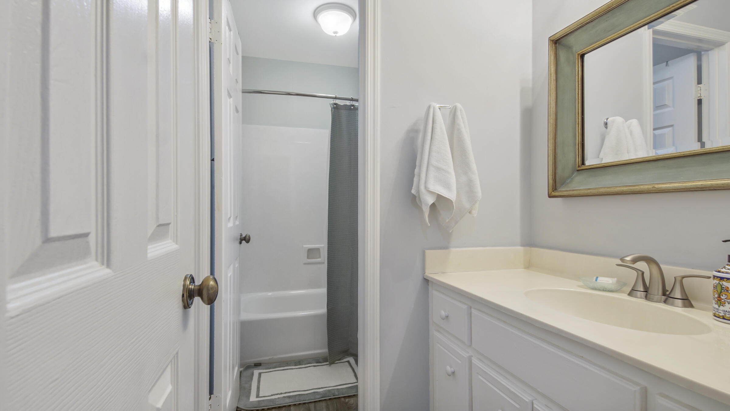 51 Cypress Street, Unit 275 Santa Rosa Beach, FL 32459 - Photo 20 of 37 a bathroom with a sink and a mirror