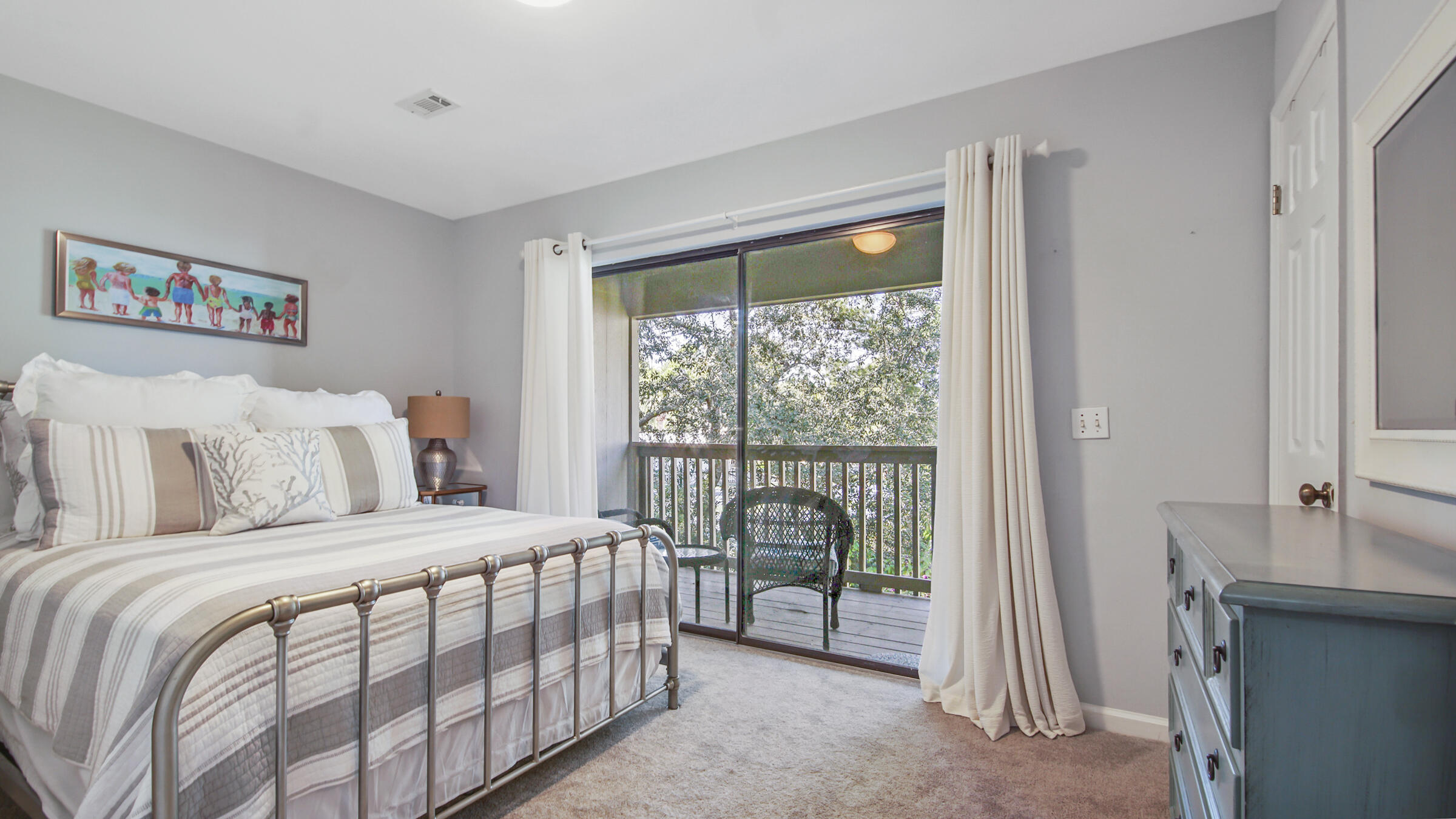 51 Cypress Street, Unit 275 Santa Rosa Beach, FL 32459 - Photo 21 of 37 a bedroom with a large bed and a large window