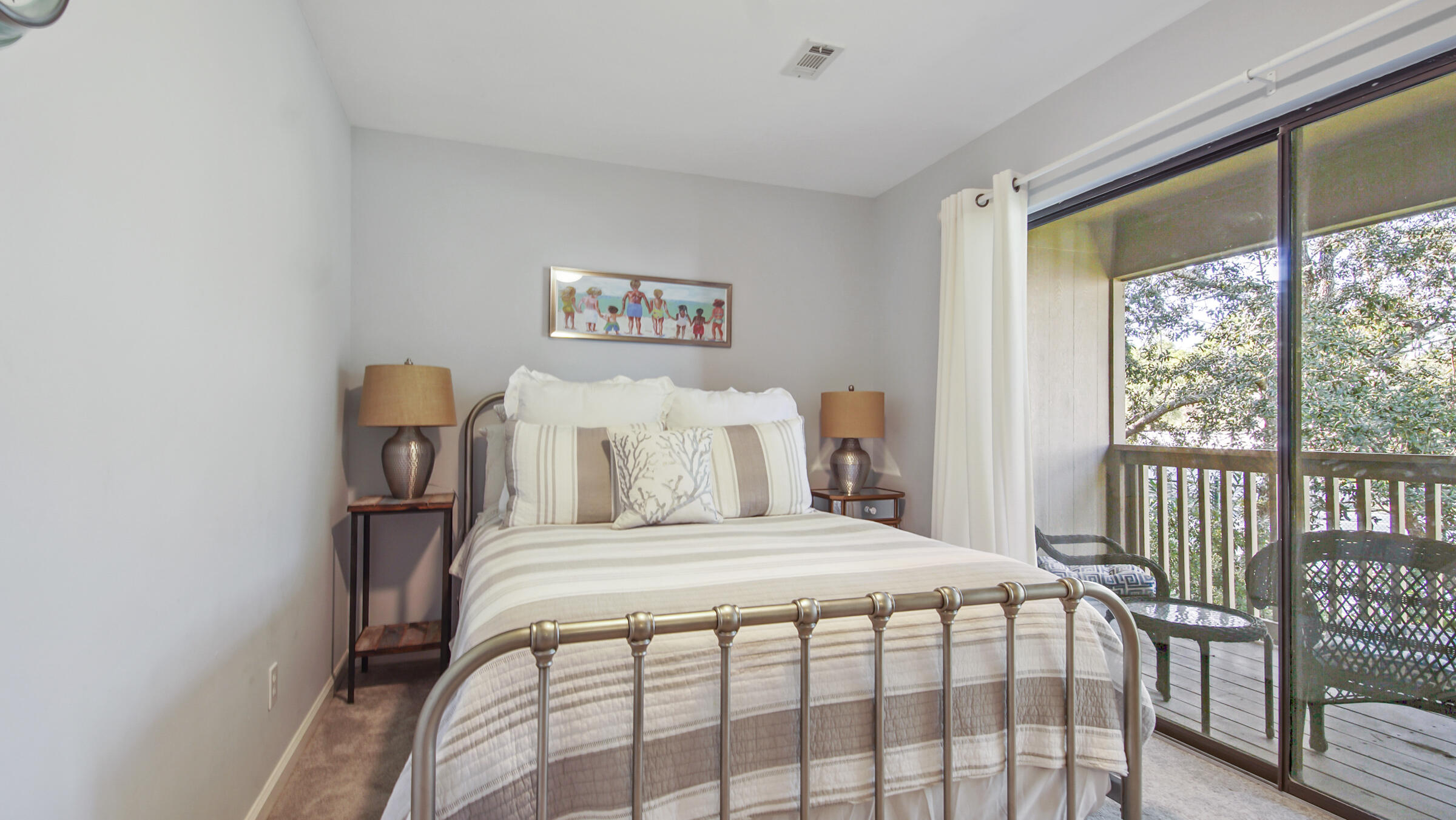 51 Cypress Street, Unit 275 Santa Rosa Beach, FL 32459 - Photo 22 of 37 a bedroom with a bed and a large window
