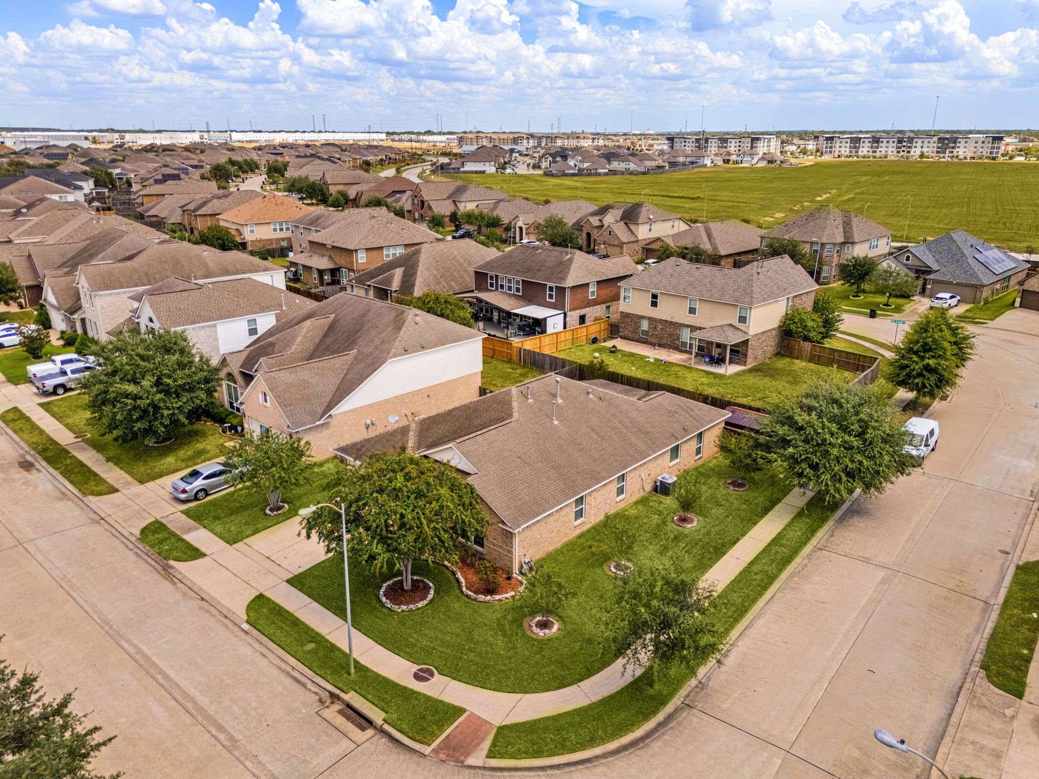 3102 Single Ridge Way Katy, TX 77493 - Photo 3 of 23 Stunning aerial perspective highlighting the prime location of 3102 Single Ridge Way on its expansive corner lot. This view showcases the property's generous boundaries and how beautifully the home sits within its spacious lot, offering a clear look at the surrounding neighborhood.