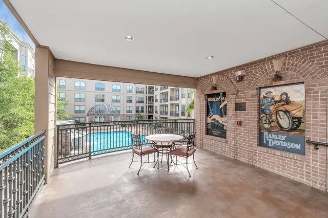 a media room with lots of chairs and a projector screen