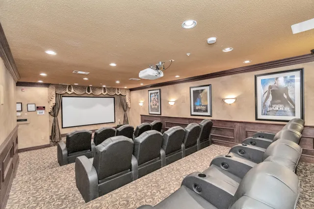 a living room with lots of furniture and a rug