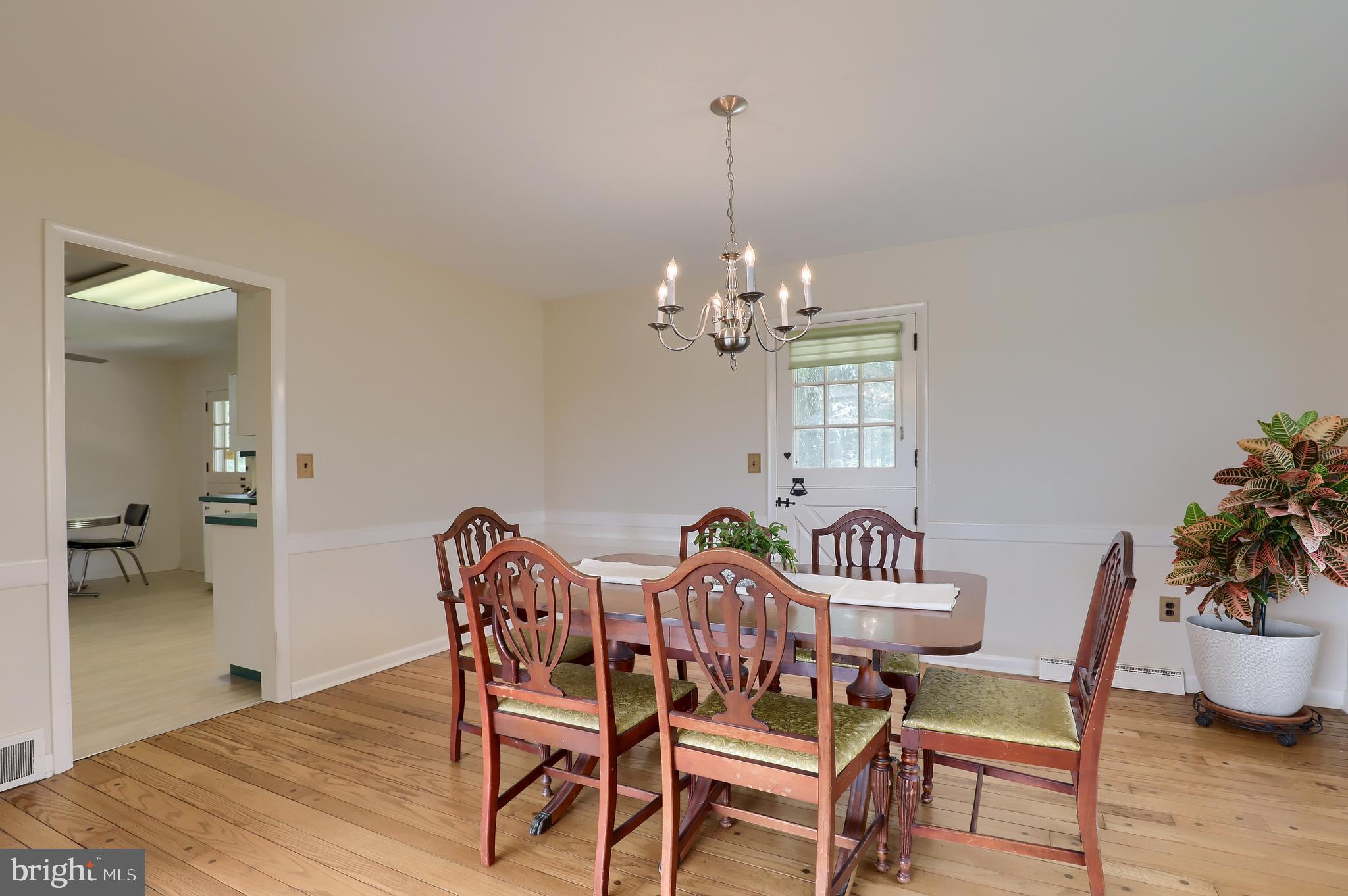 1669 Sleepyhollow Road York, PA 17403 - Photo 15 of 63 Formal Dining Room w/ Door to rear deck