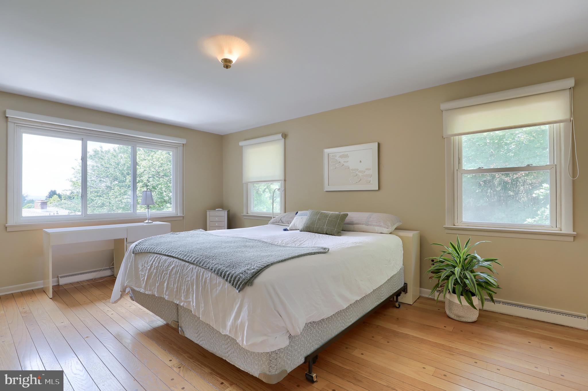 1669 Sleepyhollow Road York, PA 17403 - Photo 26 of 63 Primary Bedroom w/wood floors