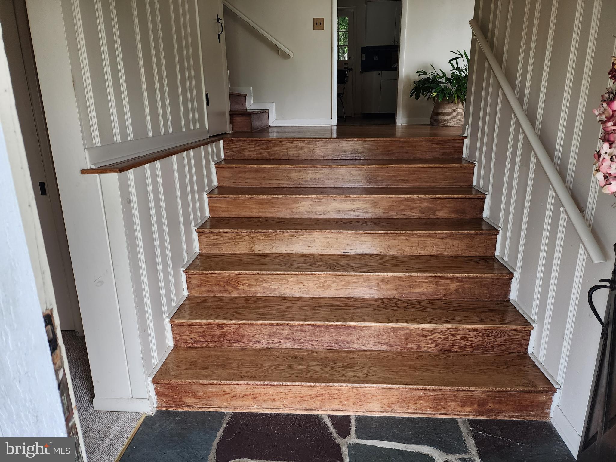 1669 Sleepyhollow Road York, PA 17403 - Photo 10 of 63 Foyer Stairs to Primary Level
