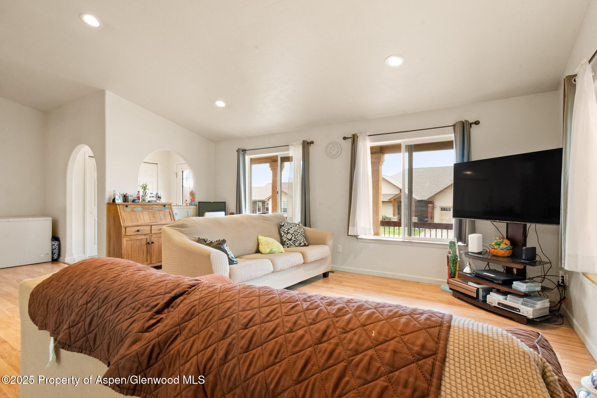 1760 Anvil View Avenue Rifle, CO 81650 - Photo 6 of 22 a bedroom with a bed and a flat screen tv