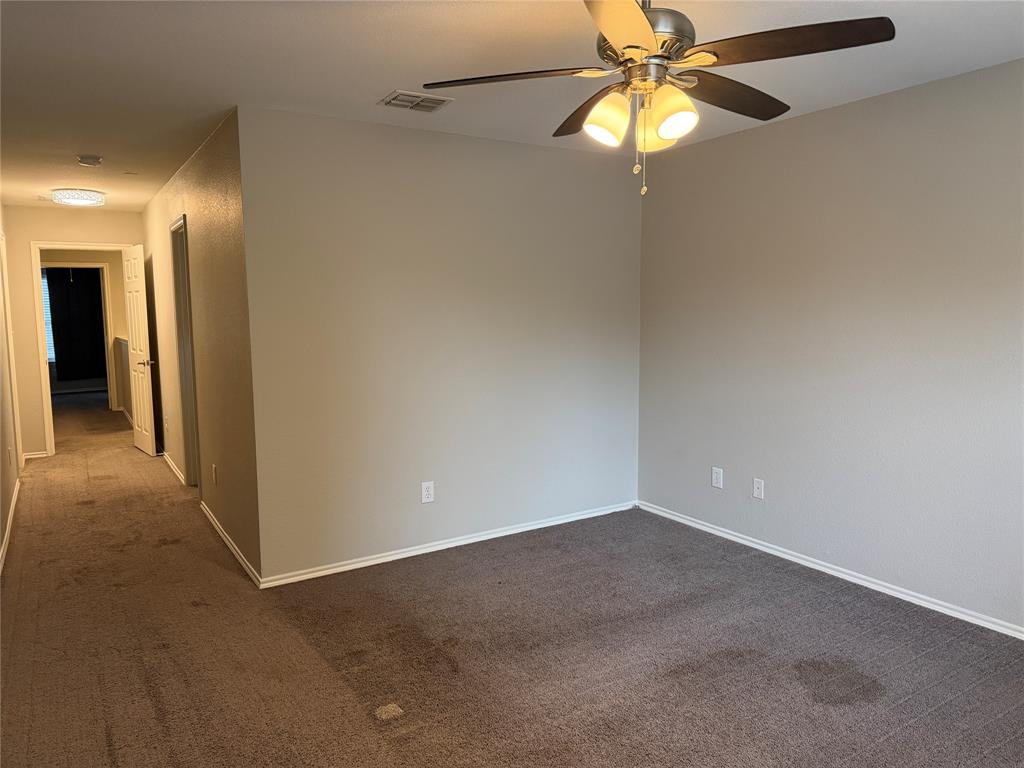 3109 Bonsai Drive Plano, TX 75093 - Photo 13 of 25 a view of an empty room and chandelier fan