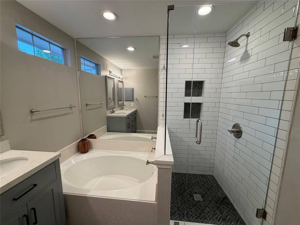 3109 Bonsai Drive Plano, TX 75093 - Photo 16 of 25 a bathroom with a sink a toilet and shower