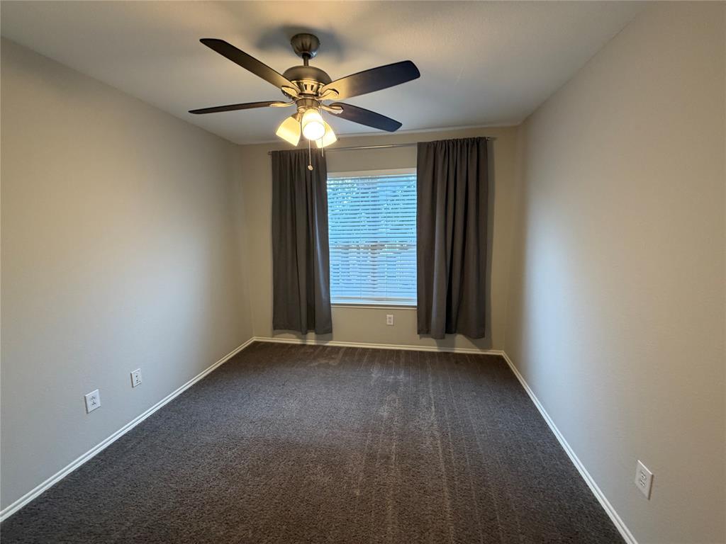 3109 Bonsai Drive Plano, TX 75093 - Photo 19 of 25 an empty room with wooden floor closet and fan