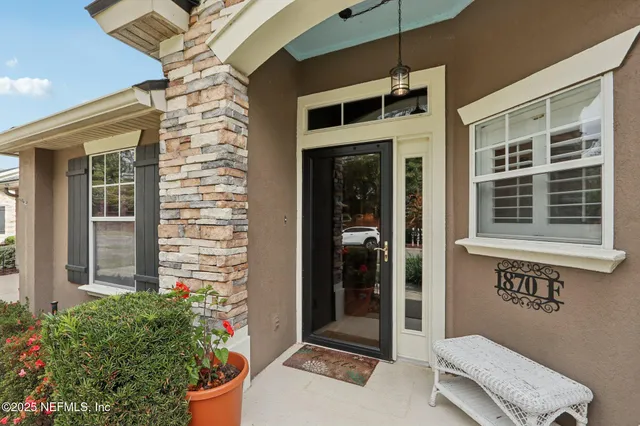 a front view of a house with a porch