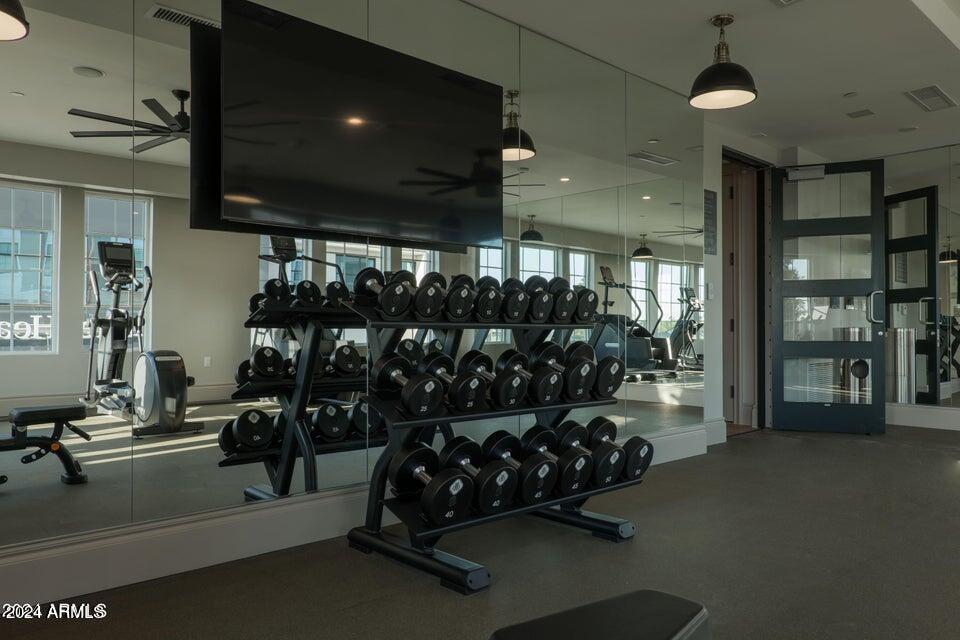 4240 East Camelback Road, Unit 214 Phoenix, AZ 85018 - Photo 19 of 20 a room with gym equipment