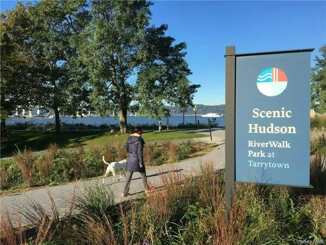 a sign that is on a tree