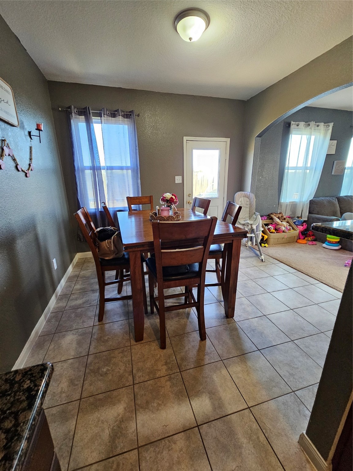 5538 Rainbow Rd. Baytown, TX 77523 - Photo 5 of 11 a dining room with furniture and window