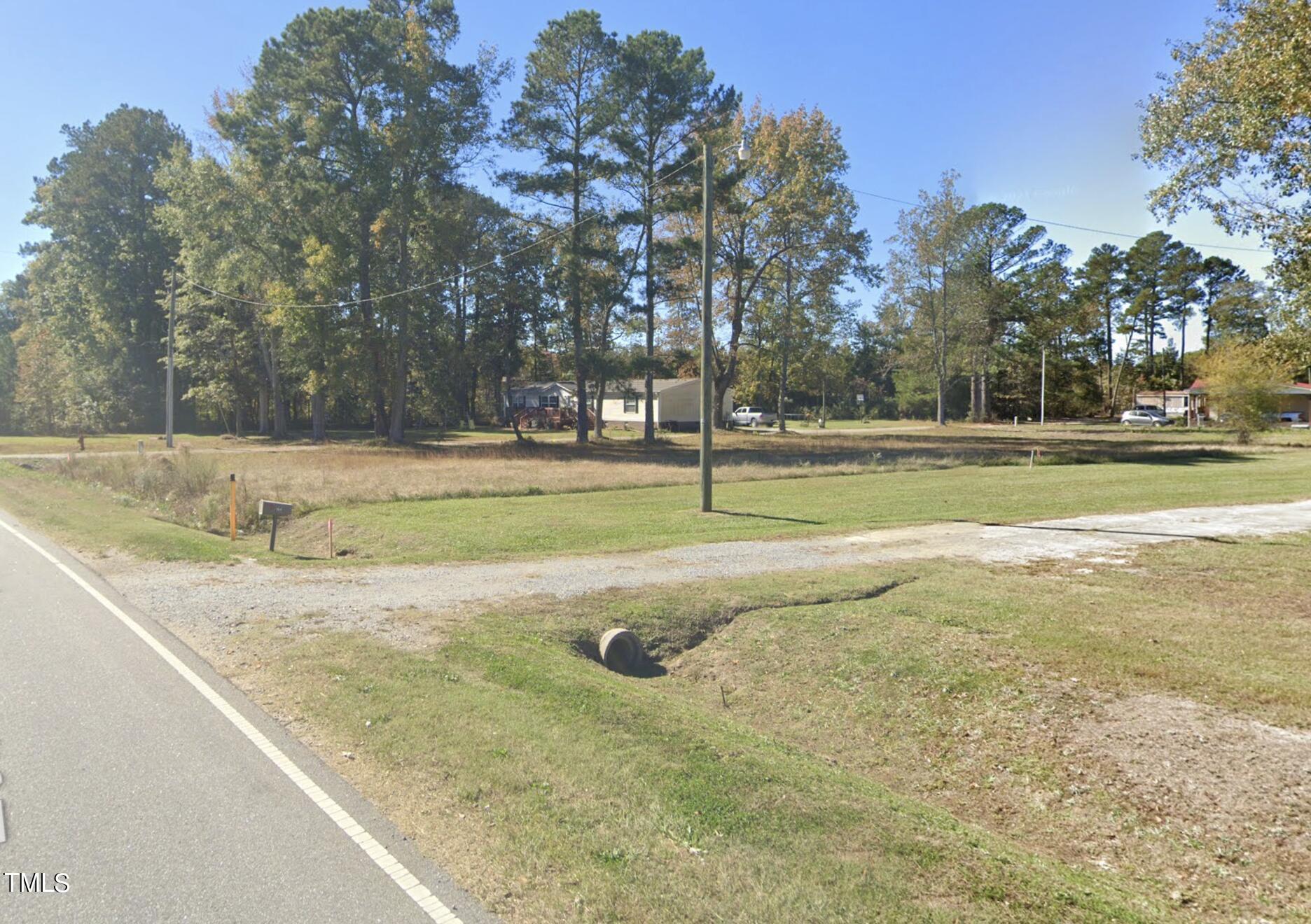 1462 Lebanon Church Road Garysburg, NC 27831 - Photo 2 of 4 a view of a backyard