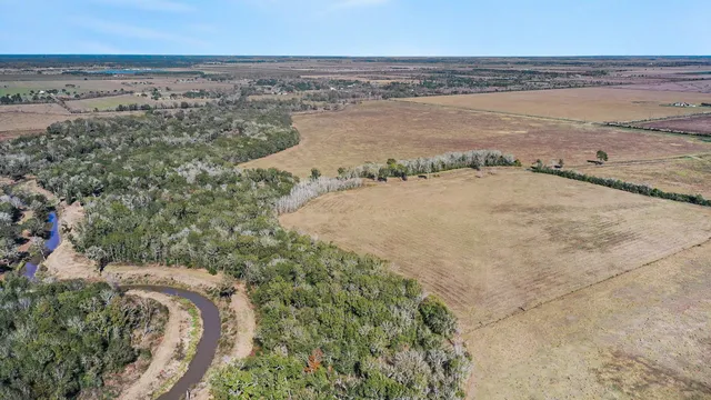 an aerial view of beach and ocean