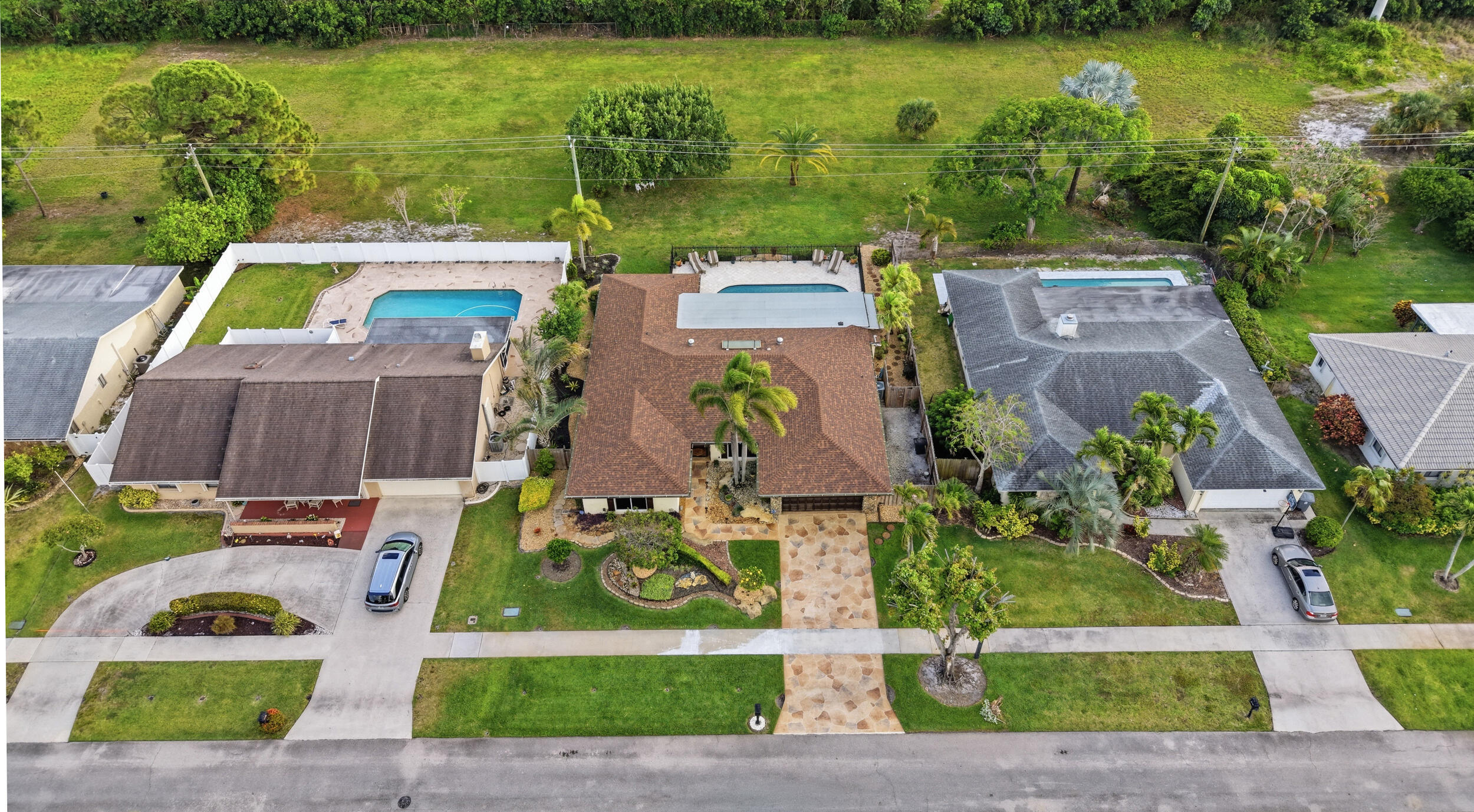 4780 Brandywine Drive Boca Raton, FL 33487 - Photo 35 of 43 an aerial view of residential houses with outdoor space and lake view