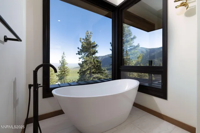 a white bath tub sitting in a bathroom
