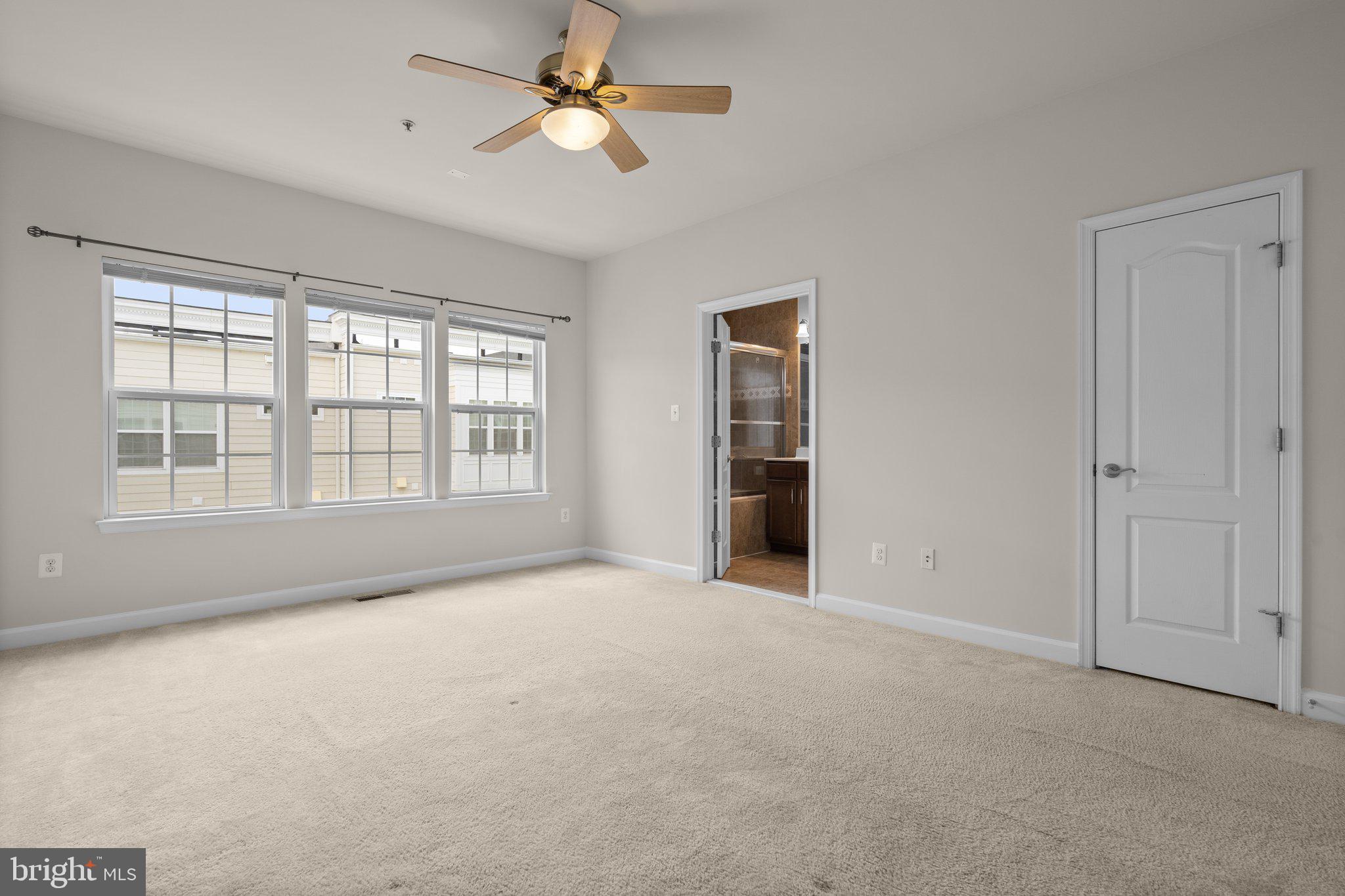 11669 Leesborough Circle Silver Spring, MD 20902 - Photo 20 of 46 a view of an empty room with a window