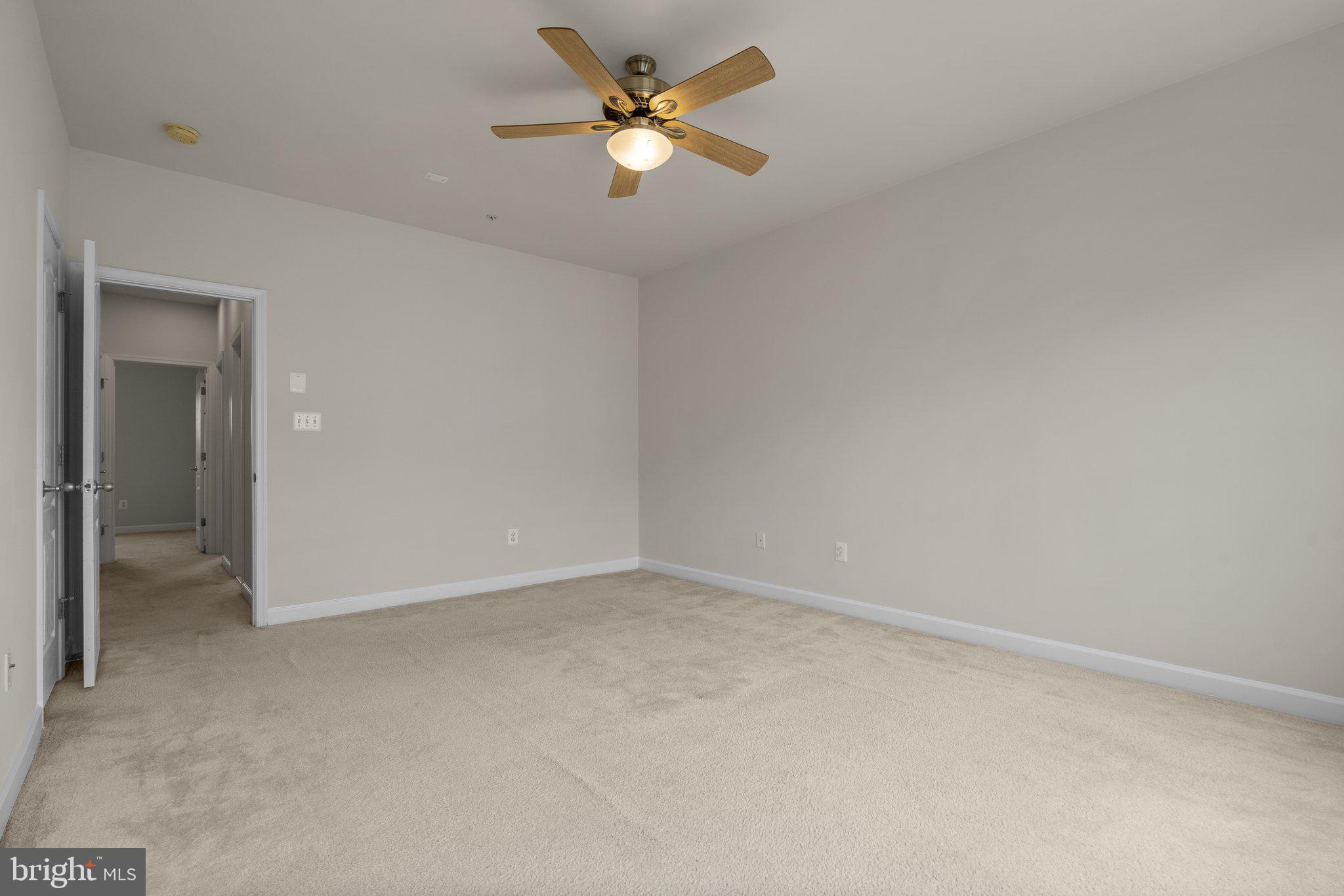 11669 Leesborough Circle Silver Spring, MD 20902 - Photo 22 of 46 a view of an empty room