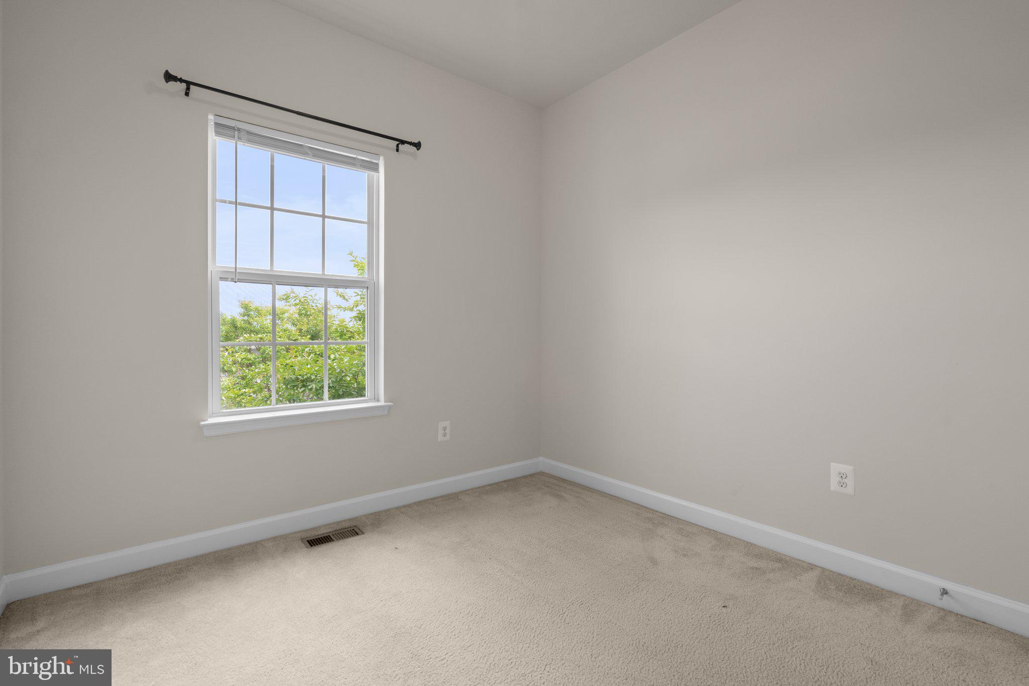11669 Leesborough Circle Silver Spring, MD 20902 - Photo 29 of 46 an empty room with a window