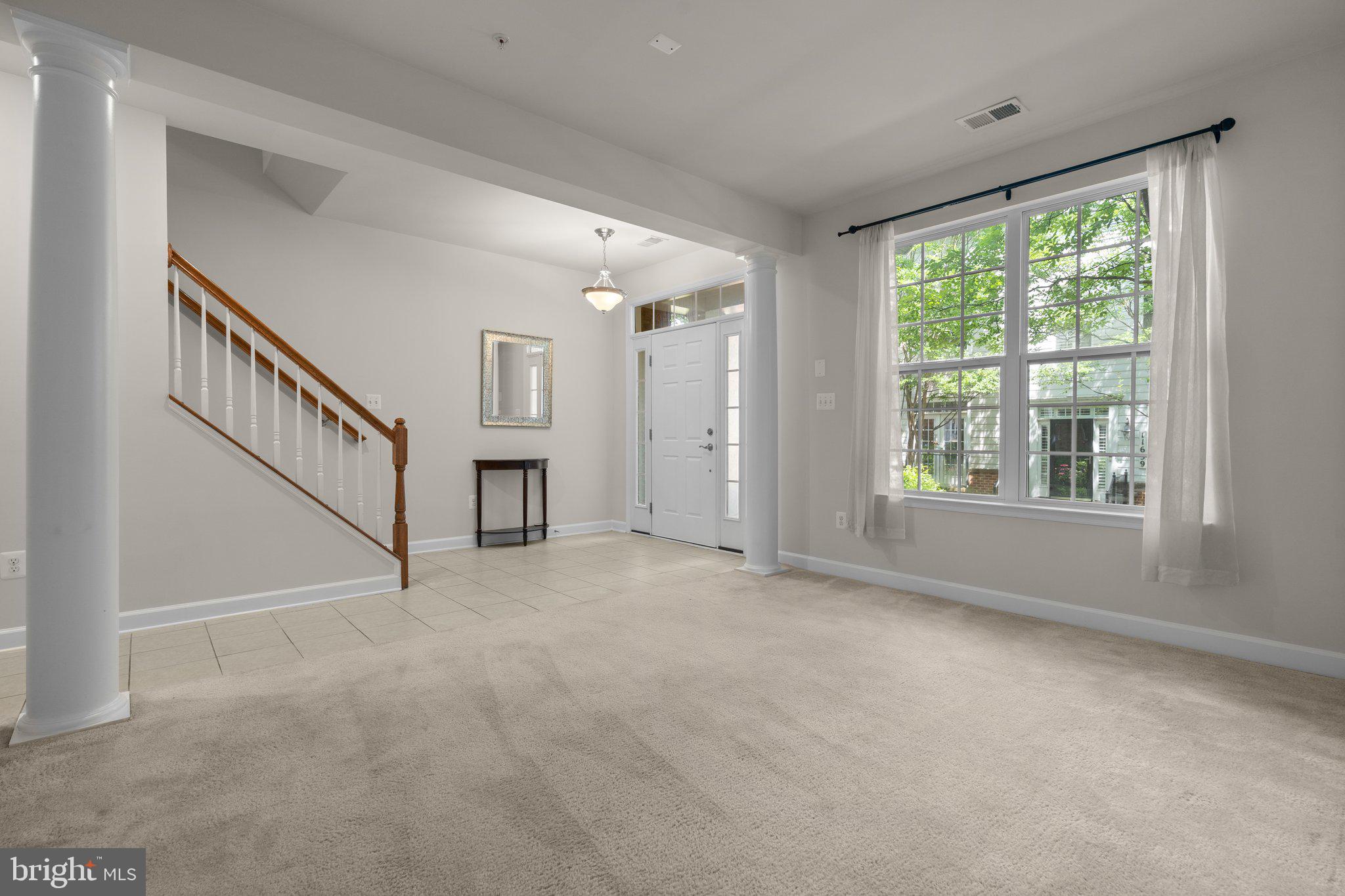 11669 Leesborough Circle Silver Spring, MD 20902 - Photo 39 of 46 a view of an empty room with a window