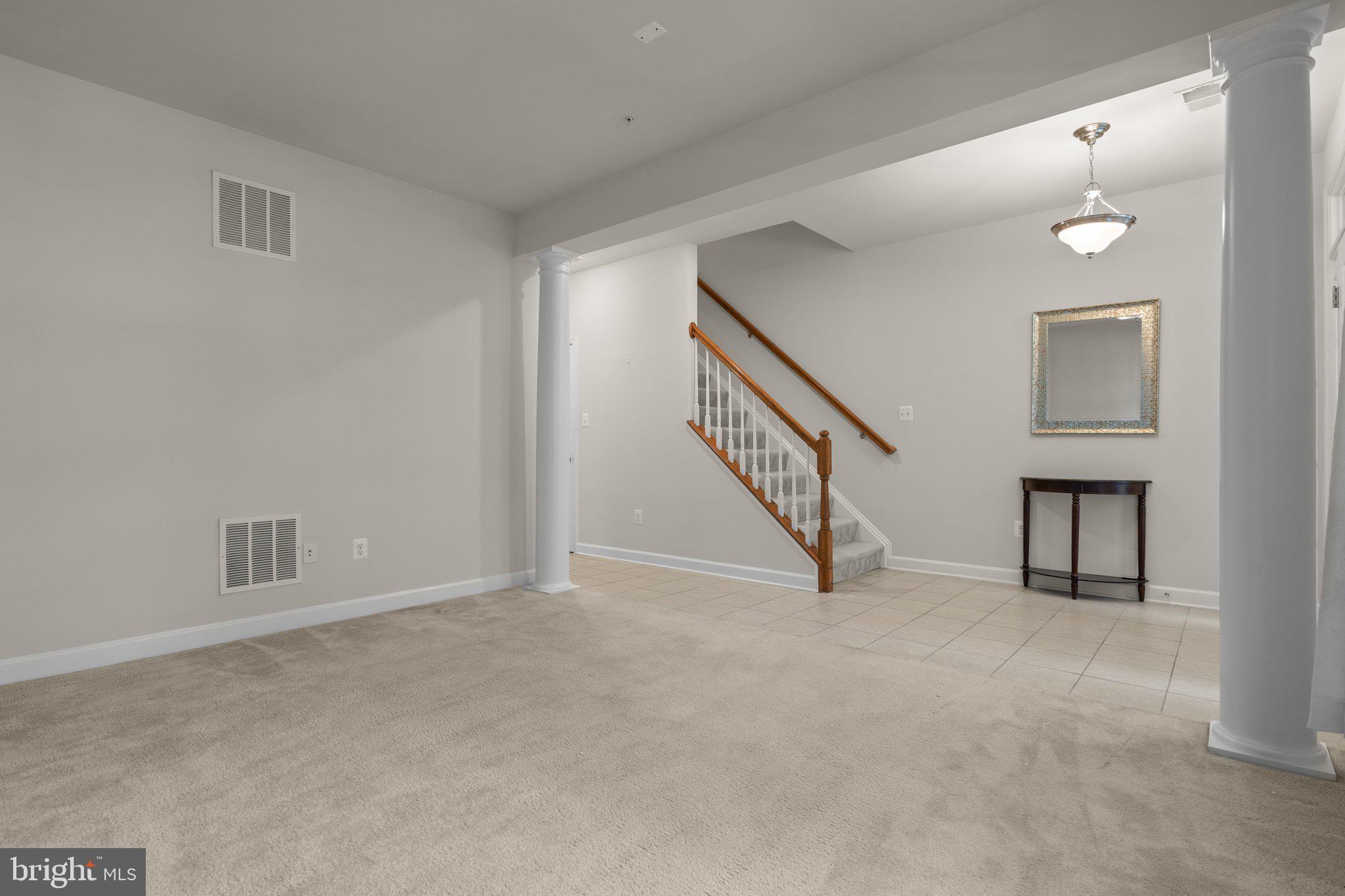 11669 Leesborough Circle Silver Spring, MD 20902 - Photo 40 of 46 a view of an empty room with stairs