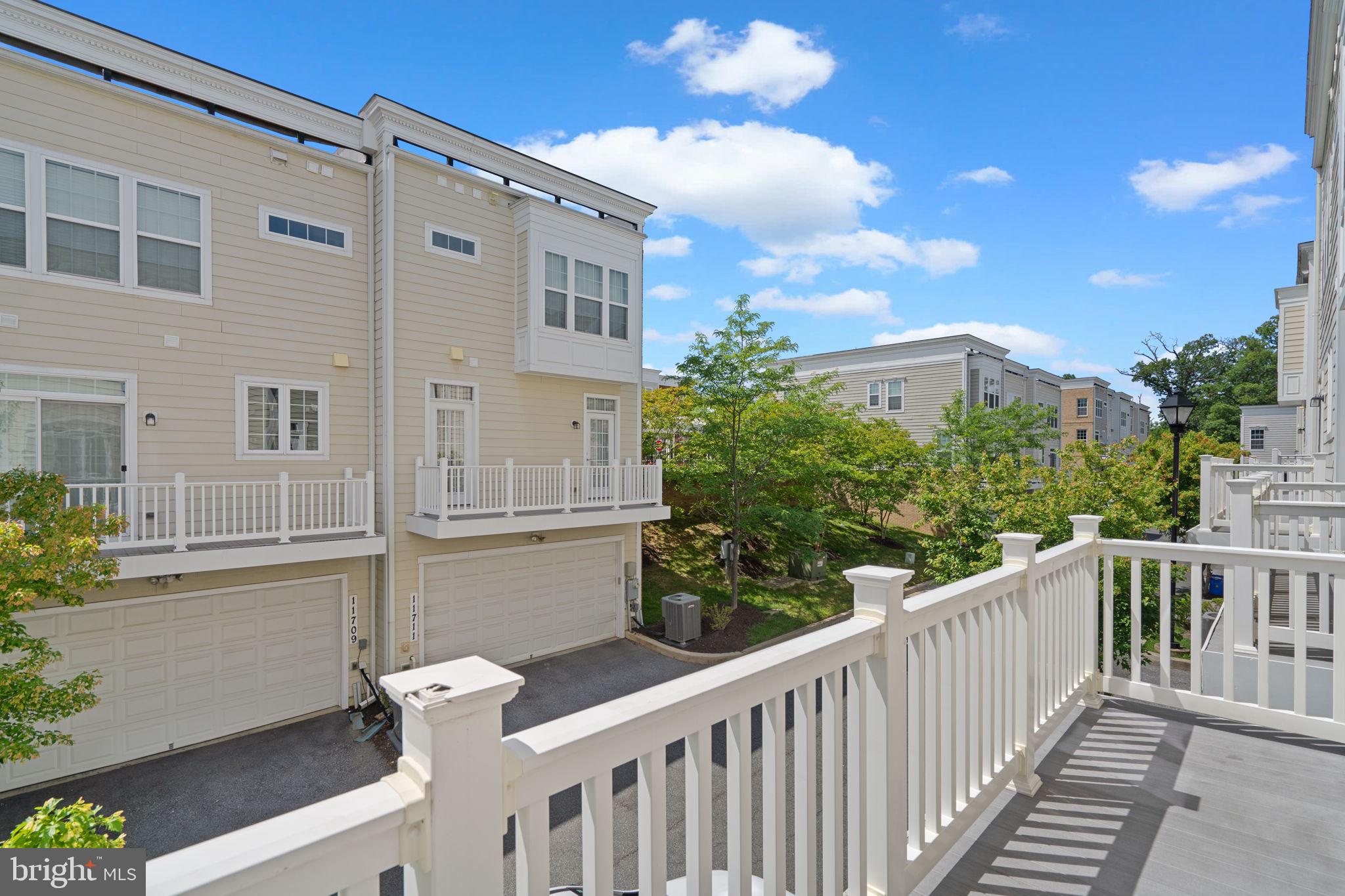 11669 Leesborough Circle Silver Spring, MD 20902 - Photo 42 of 46 a view of a balcony with chairs