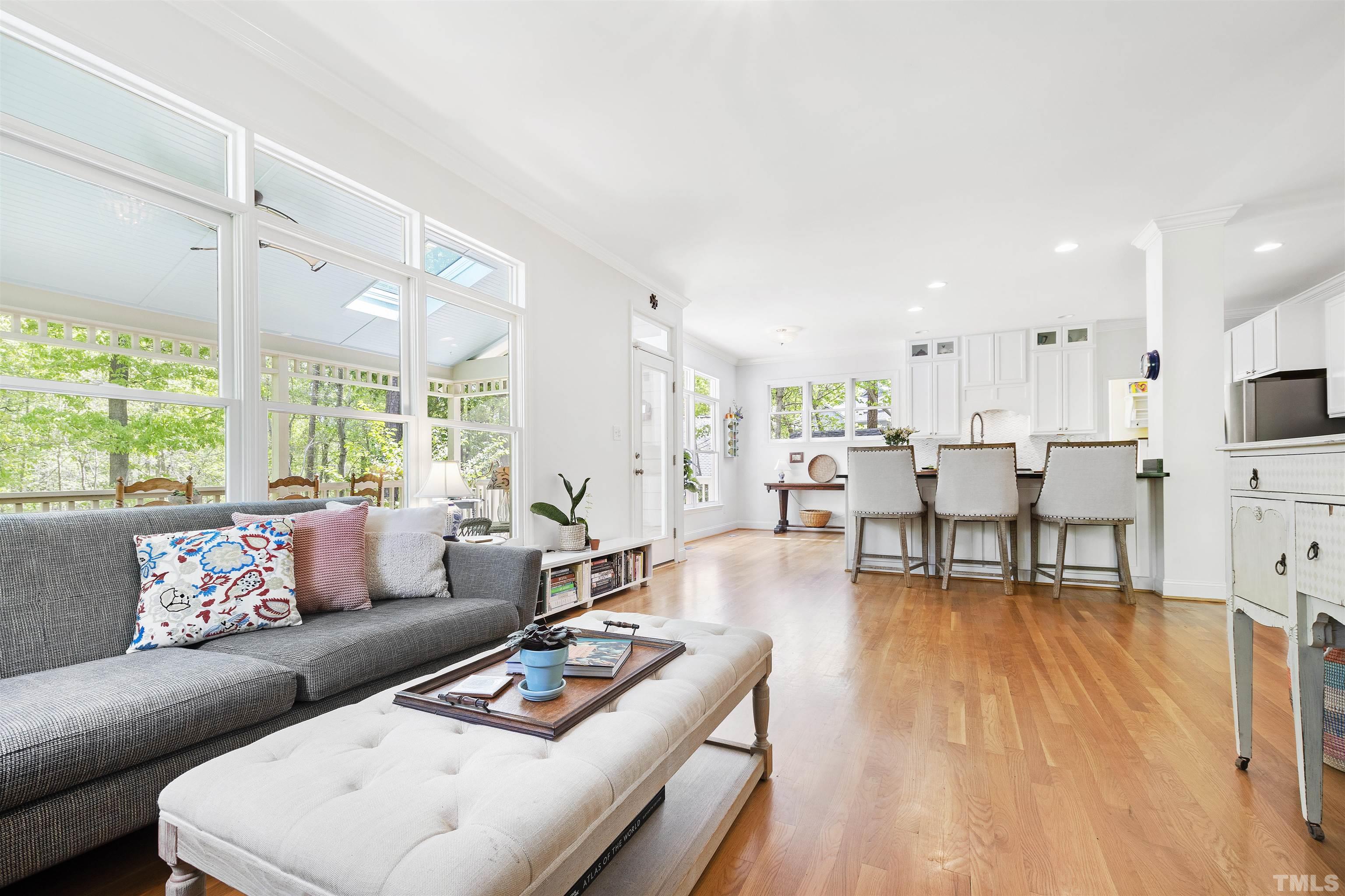 7039 Calais Drive Durham, NC 27712 - Photo 13 of 33 a living room with furniture and a large window