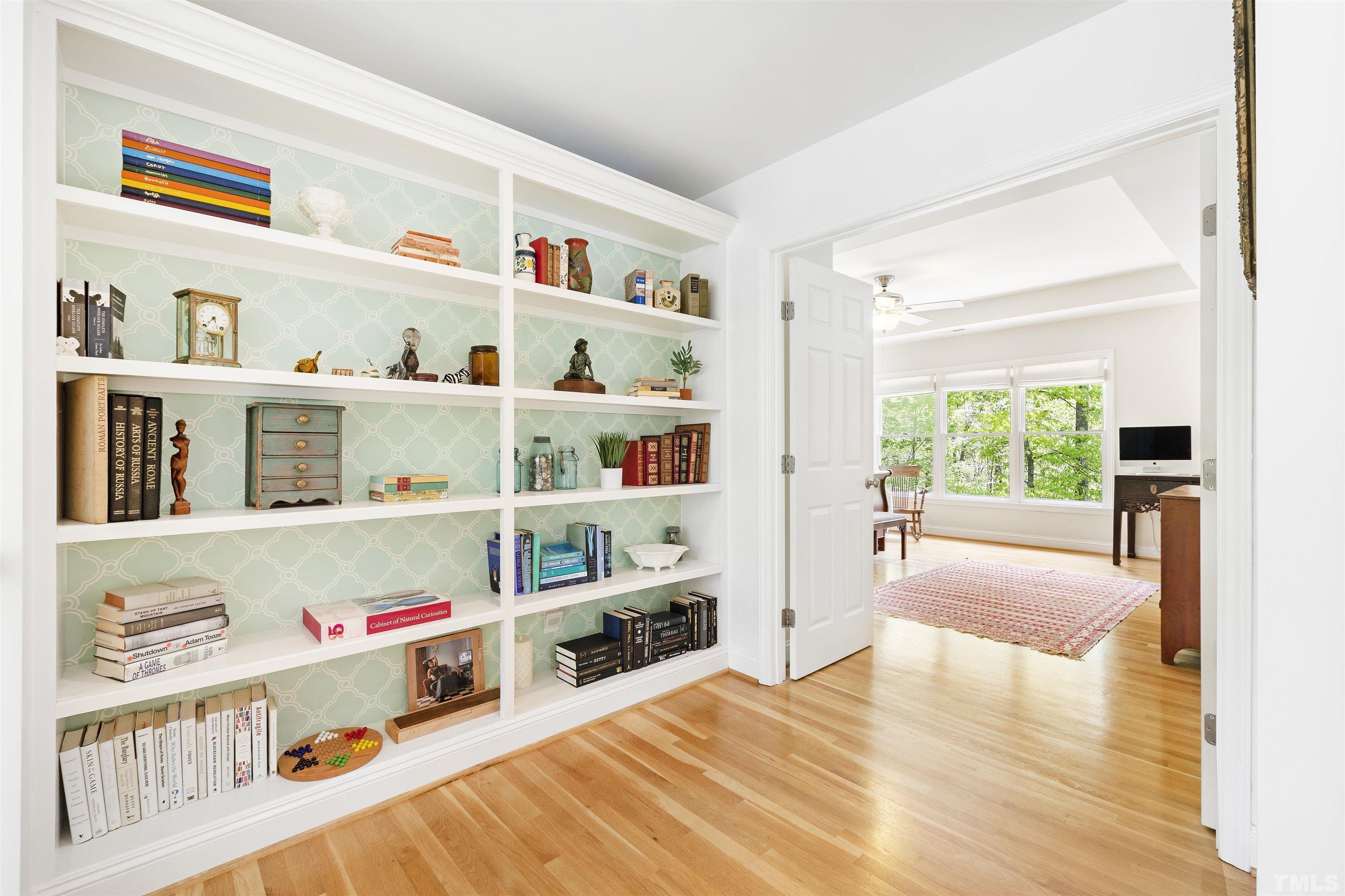 7039 Calais Drive Durham, NC 27712 - Photo 19 of 33 a room with toys and a book shelf