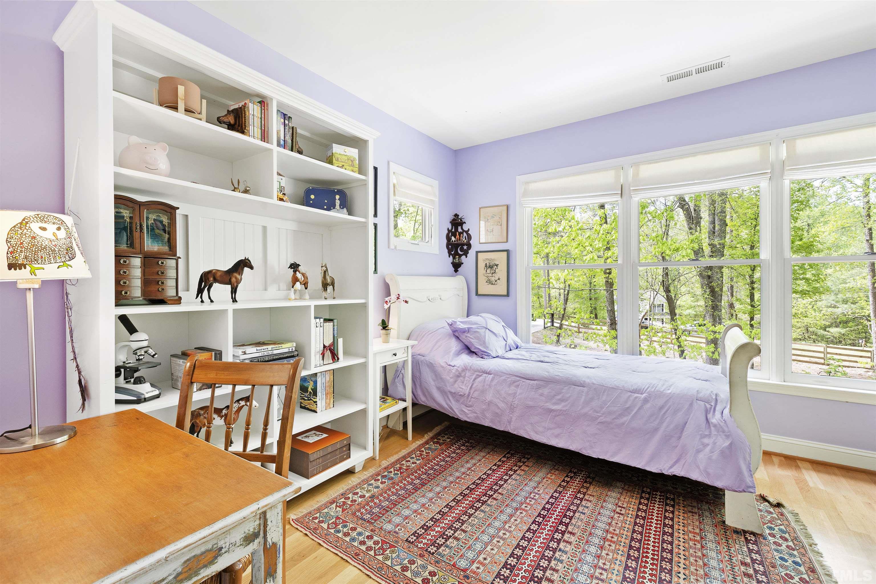 7039 Calais Drive Durham, NC 27712 - Photo 25 of 33 a living room with furniture and a window