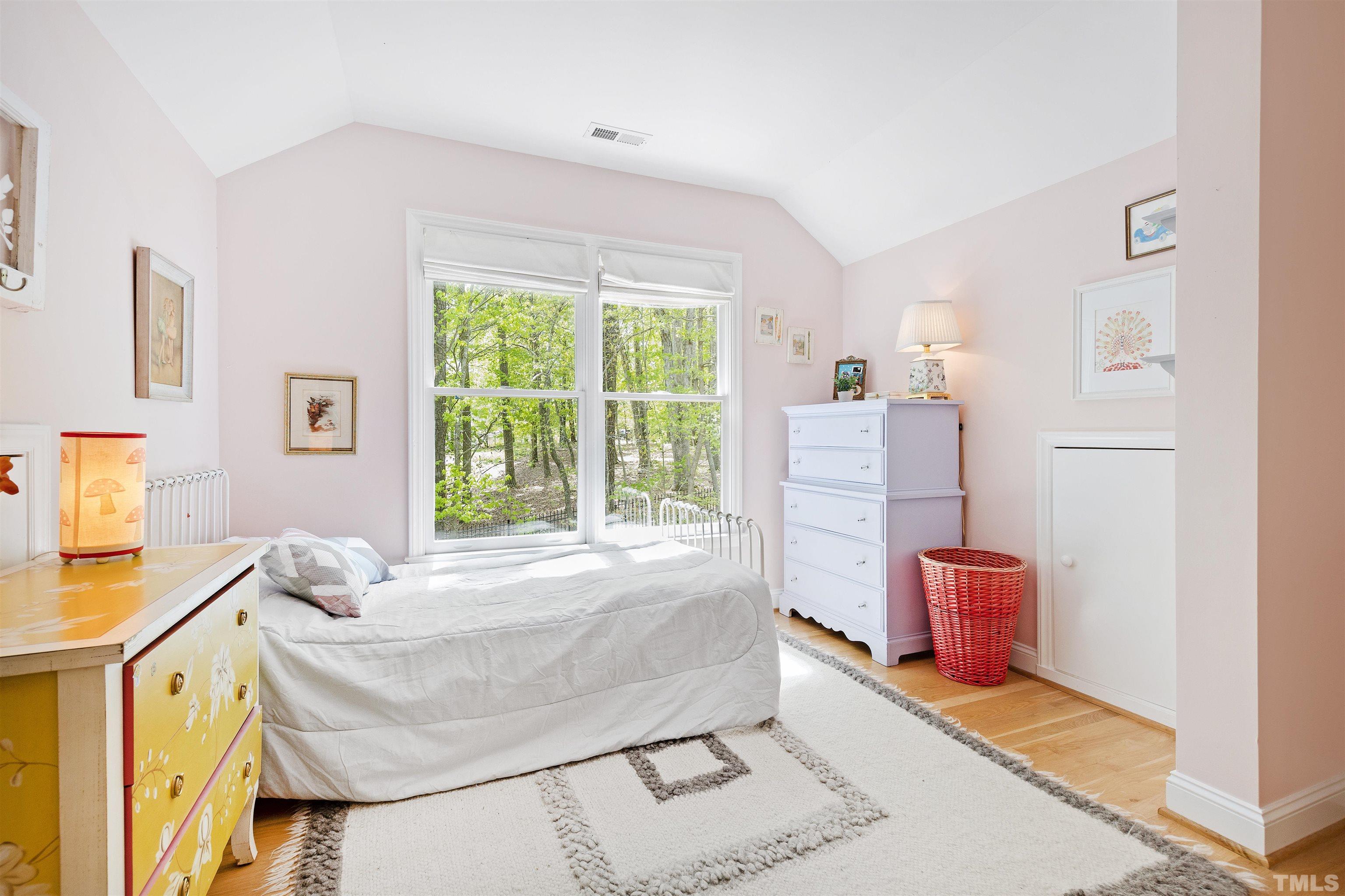 7039 Calais Drive Durham, NC 27712 - Photo 26 of 33 a bed room with a bed and a window