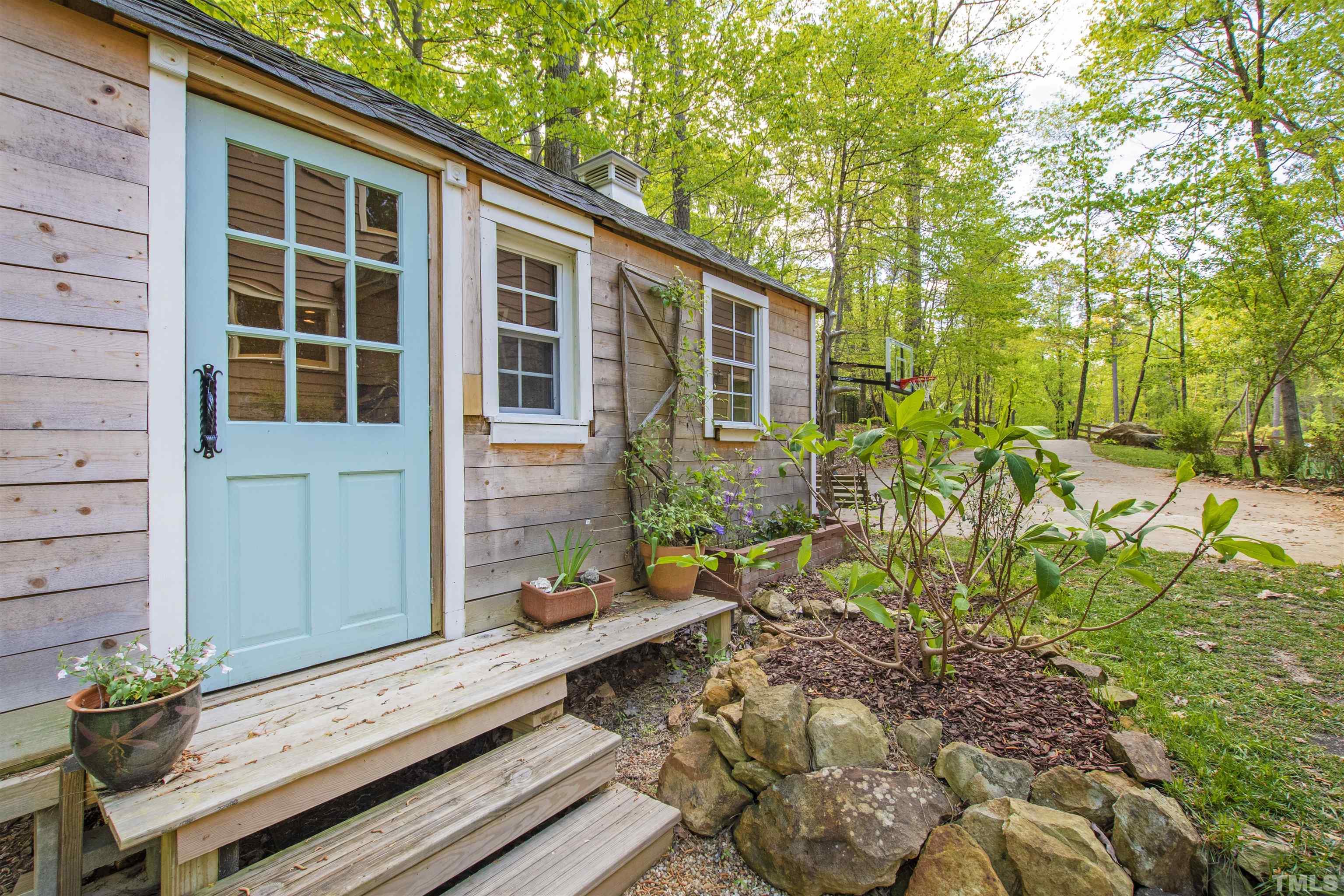 7039 Calais Drive Durham, NC 27712 - Photo 27 of 33 a front view of a house with a yard