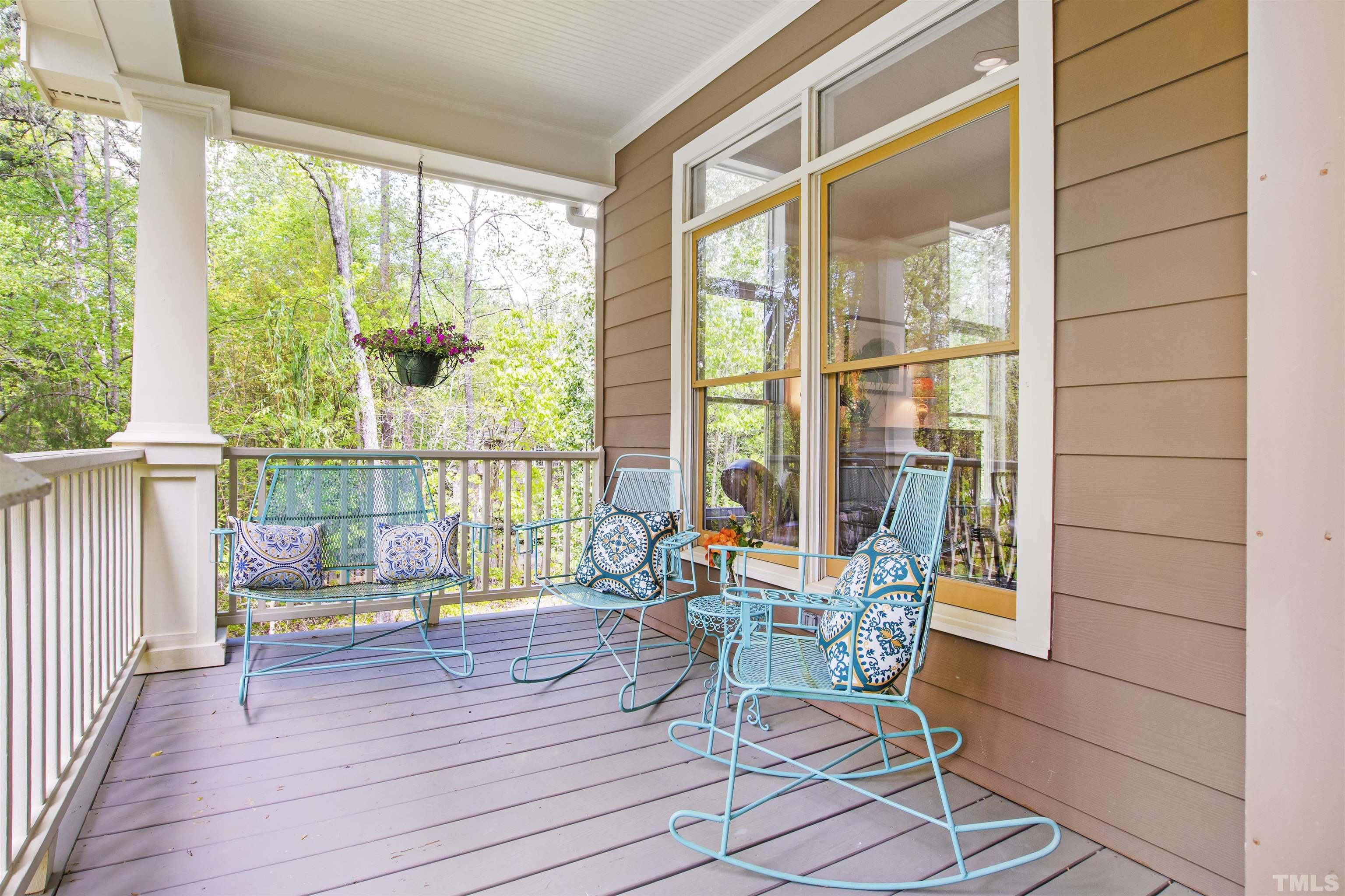 7039 Calais Drive Durham, NC 27712 - Photo 7 of 33 a work room with wooden floor and furniture