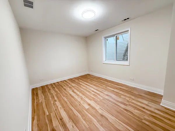 an empty room with window