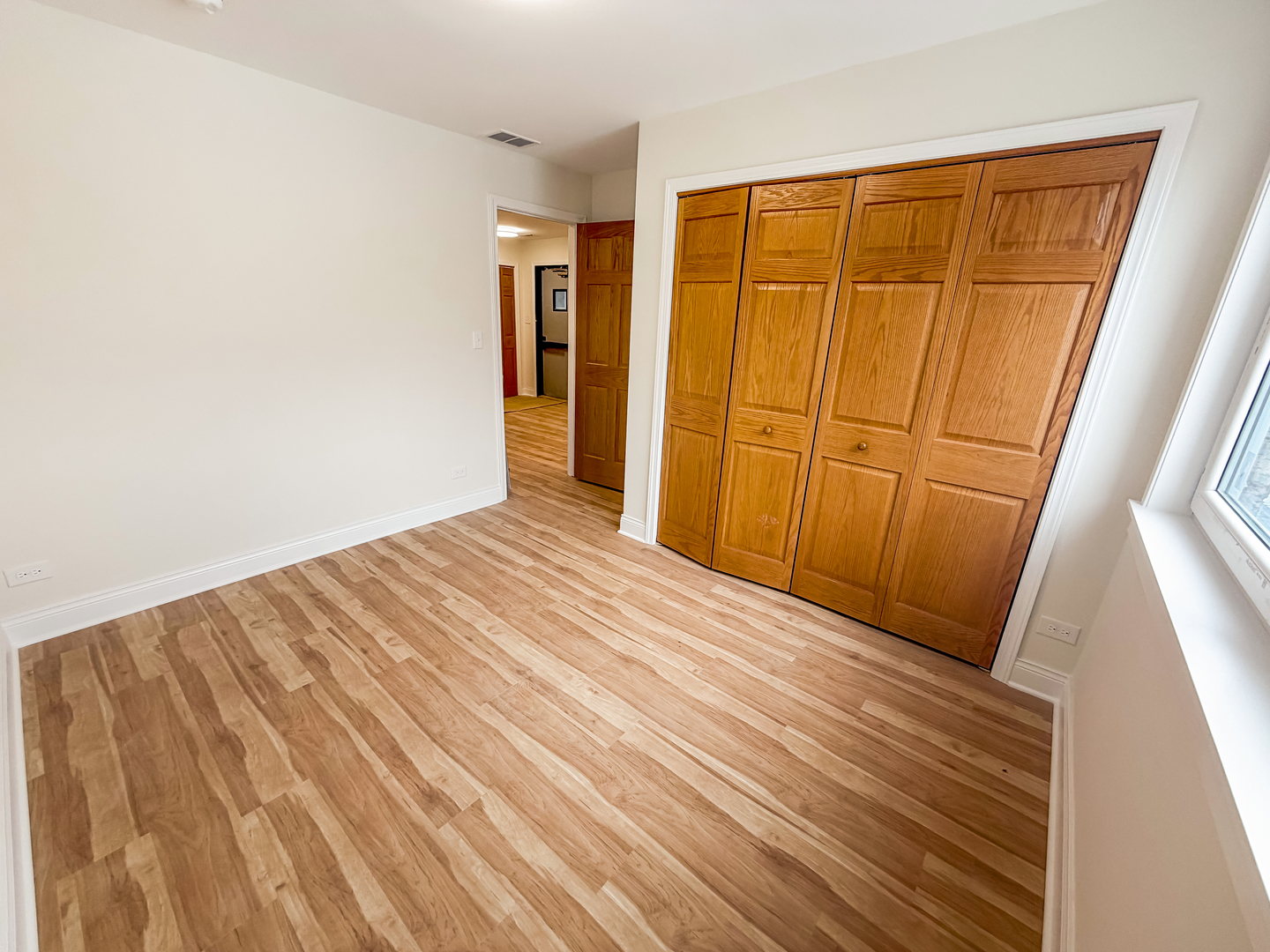 6415 West Irving Park Road, Unit 2S Chicago, IL 60634 - Photo 7 of 11 a view of empty room with front door