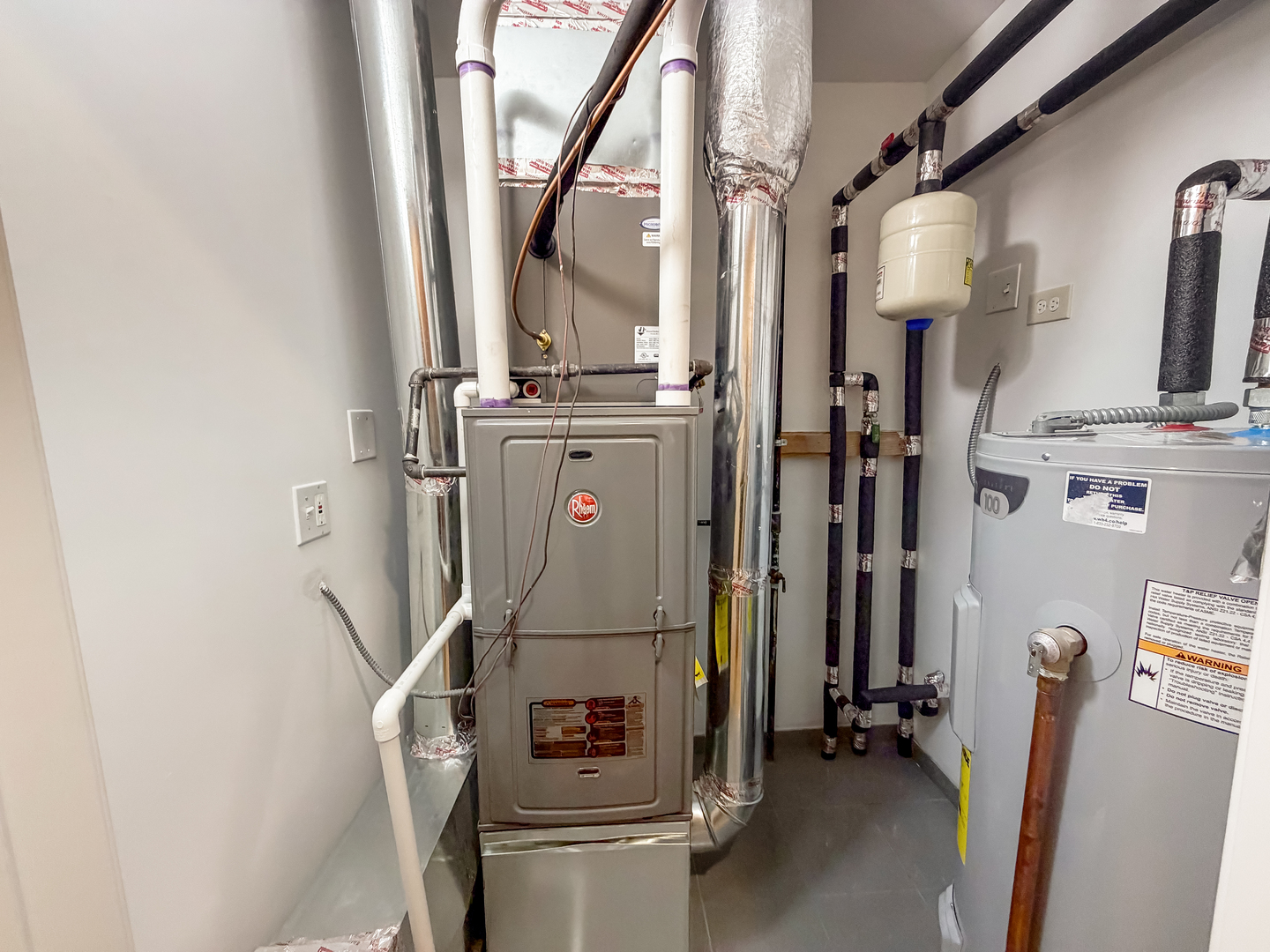 6415 West Irving Park Road, Unit 2S Chicago, IL 60634 - Photo 9 of 11 a view of walk in closet with clothes and shoes