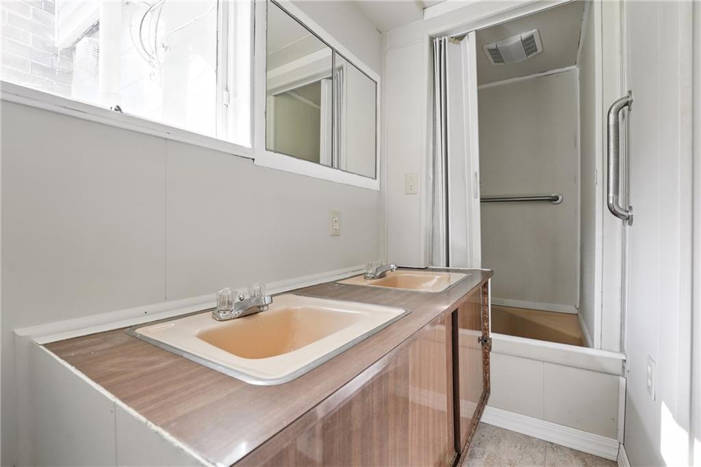 280 Rockdale Road Butler, PA 16002 - Photo 15 of 30 a bathroom with a sink and a mirror