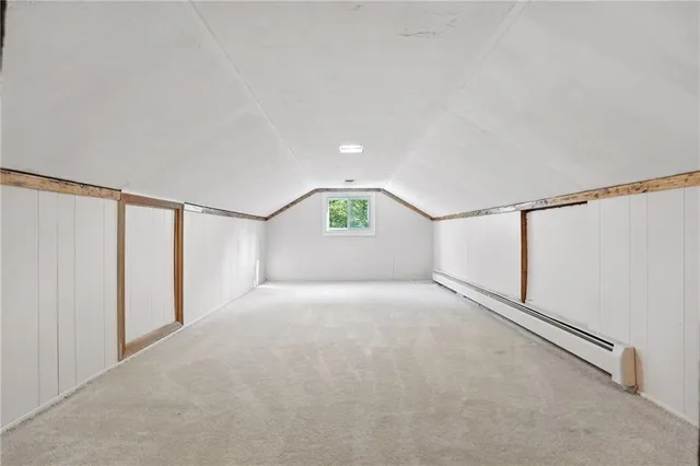 a bathroom with a sink toilet and a mirror