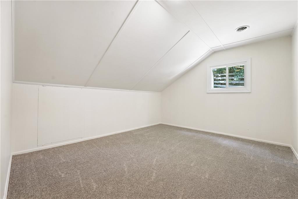 280 Rockdale Road Butler, PA 16002 - Photo 22 of 30 an empty room with a workbench