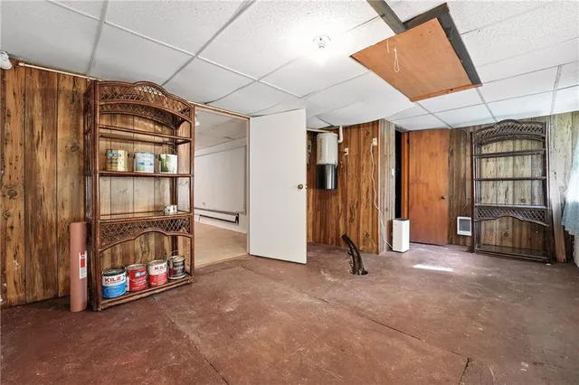 a aerial view of a houses with yard