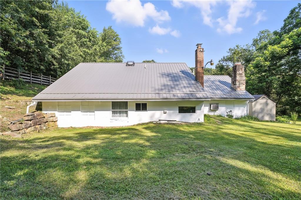 280 Rockdale Road Butler, PA 16002 - Photo 29 of 30 a front view of a house with a garden