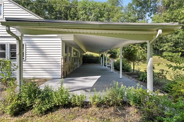 a view of a balcony with plants