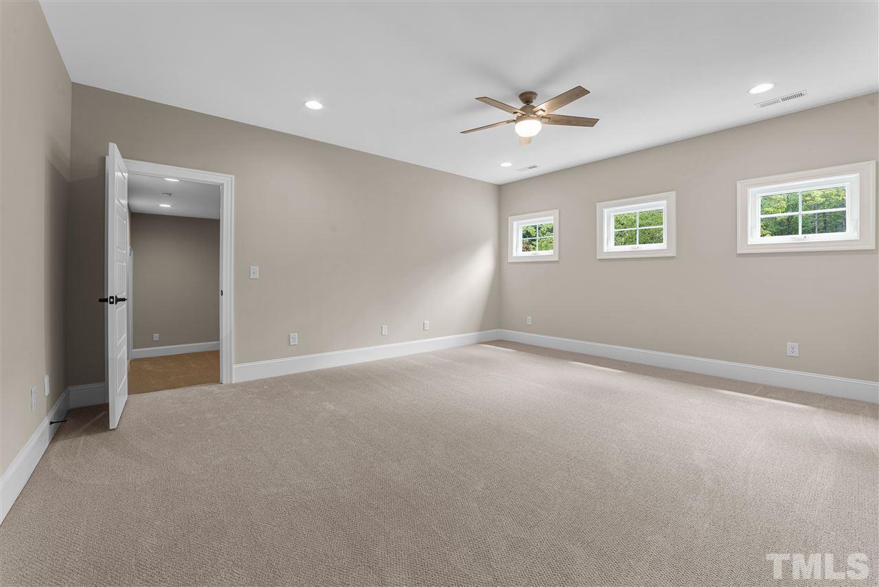 11007 Crest Mist Circle Raleigh, NC 27613 - Photo 21 of 30 In addition to the bonus, there is a rec room and a home theater (off the rec room).